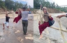 Warga Desa di Bireuen Aceh Bertaruh Nyawa usai Bencana, Lintasi Derasnya Arus Sungai dengan Tali dan Sebatang Bambu